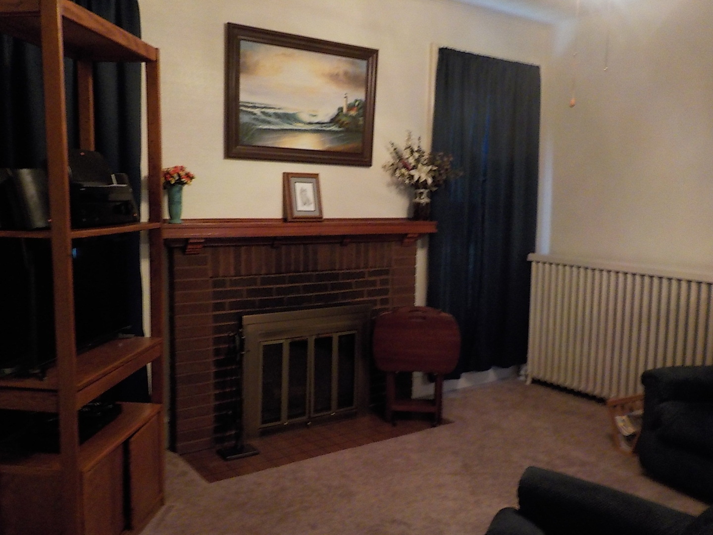 515 North Main Street Rochelle, IL 61068 - Photo 5 of 15 a living room with furniture and a fireplace
