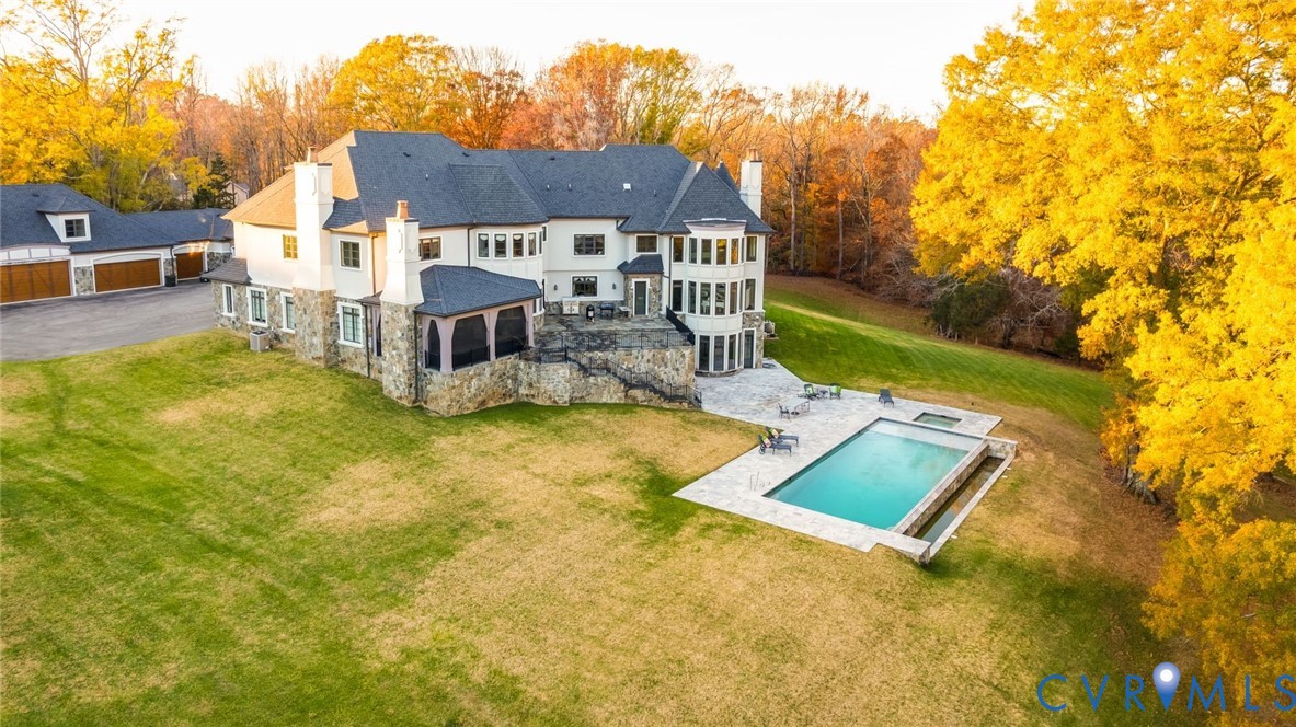 785 Oak Spring Lane Manakin-Sabot, VA 23103 - Photo 77 of 96 Resort-style pool with limestone surround, infinit