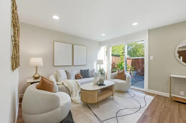 a view of entryway with wooden floor and stairs
