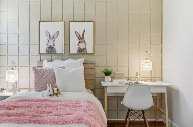 a bathroom with a granite countertop sink a toilet and a mirror