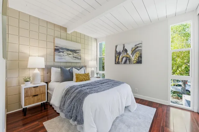 a view of a backyard with a patio and entertaining space