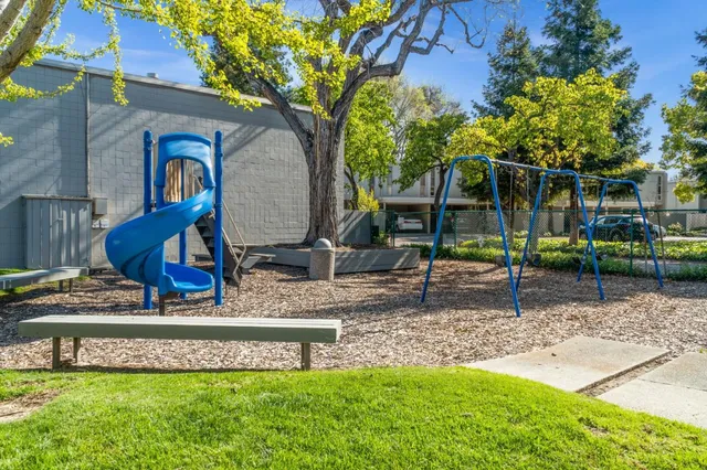 a view of a swimming pool with a garden