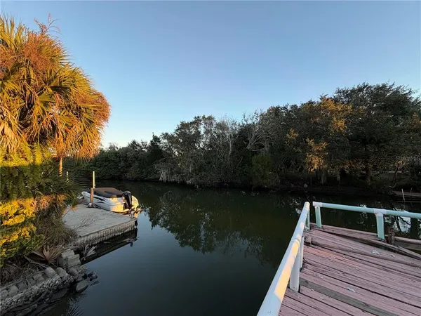 a view of a lake with a deck