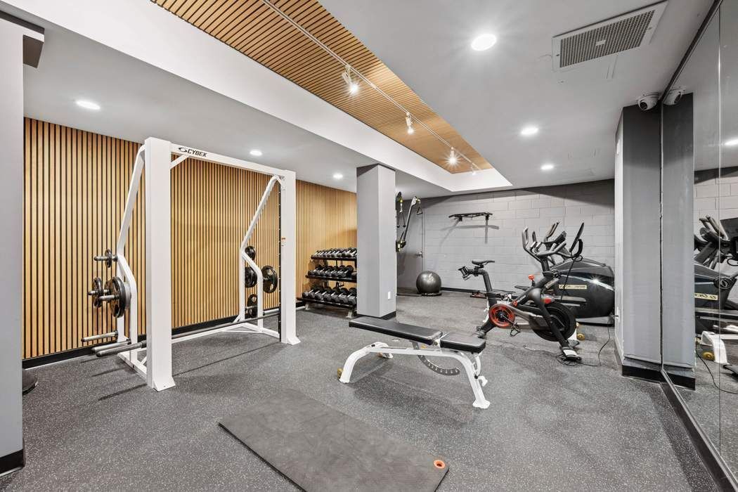 57 Front Street, Unit 604 Brooklyn, NY 11201 - Photo 12 of 14 a view of a room with gym equipment