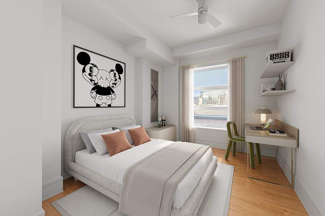 57 Front Street, Unit 604 Brooklyn, NY 11201 - Photo 7 of 14 a bedroom with a bed and a desk