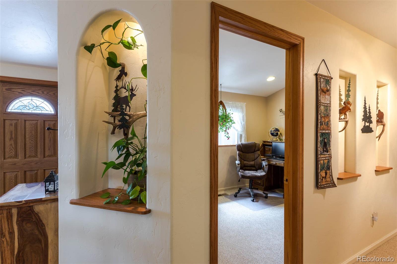 32147 Sylvan Road Golden, CO 80403 - Photo 14 of 27 a view of living room and patio