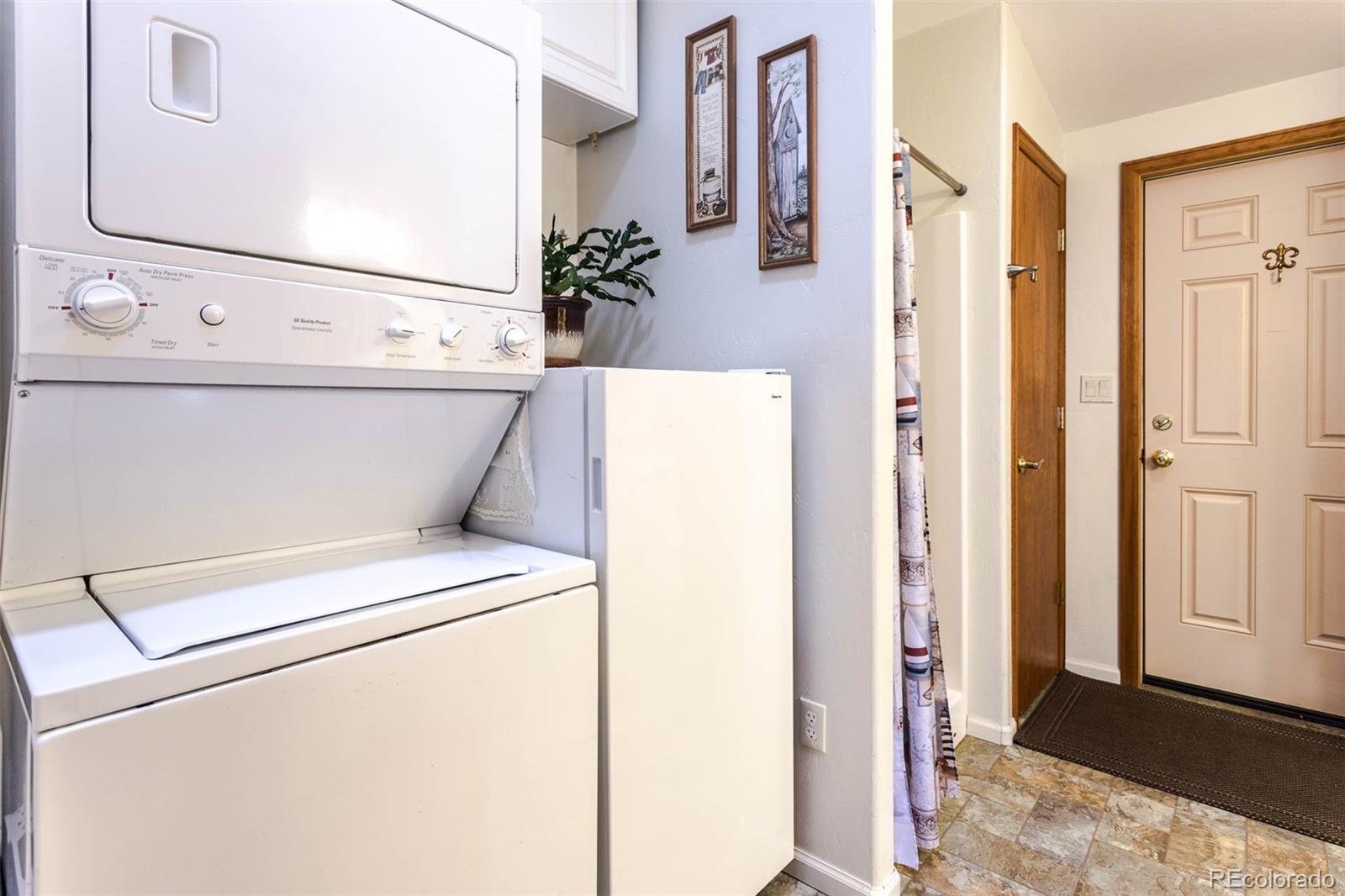 32147 Sylvan Road Golden, CO 80403 - Photo 22 of 27 a close up view of a washer and dryer