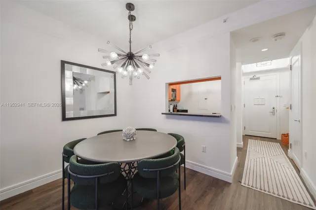 a bathroom with a sink a mirror and a shower