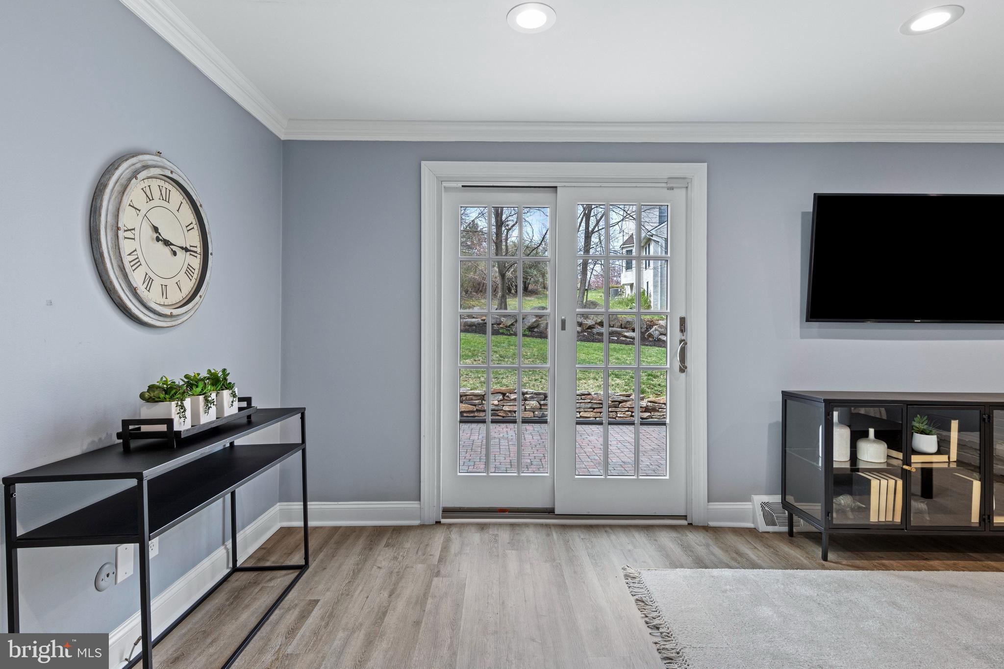 66 Oakford Road Wayne, PA 19087 - Photo 13 of 63 a living room with furniture and a window
