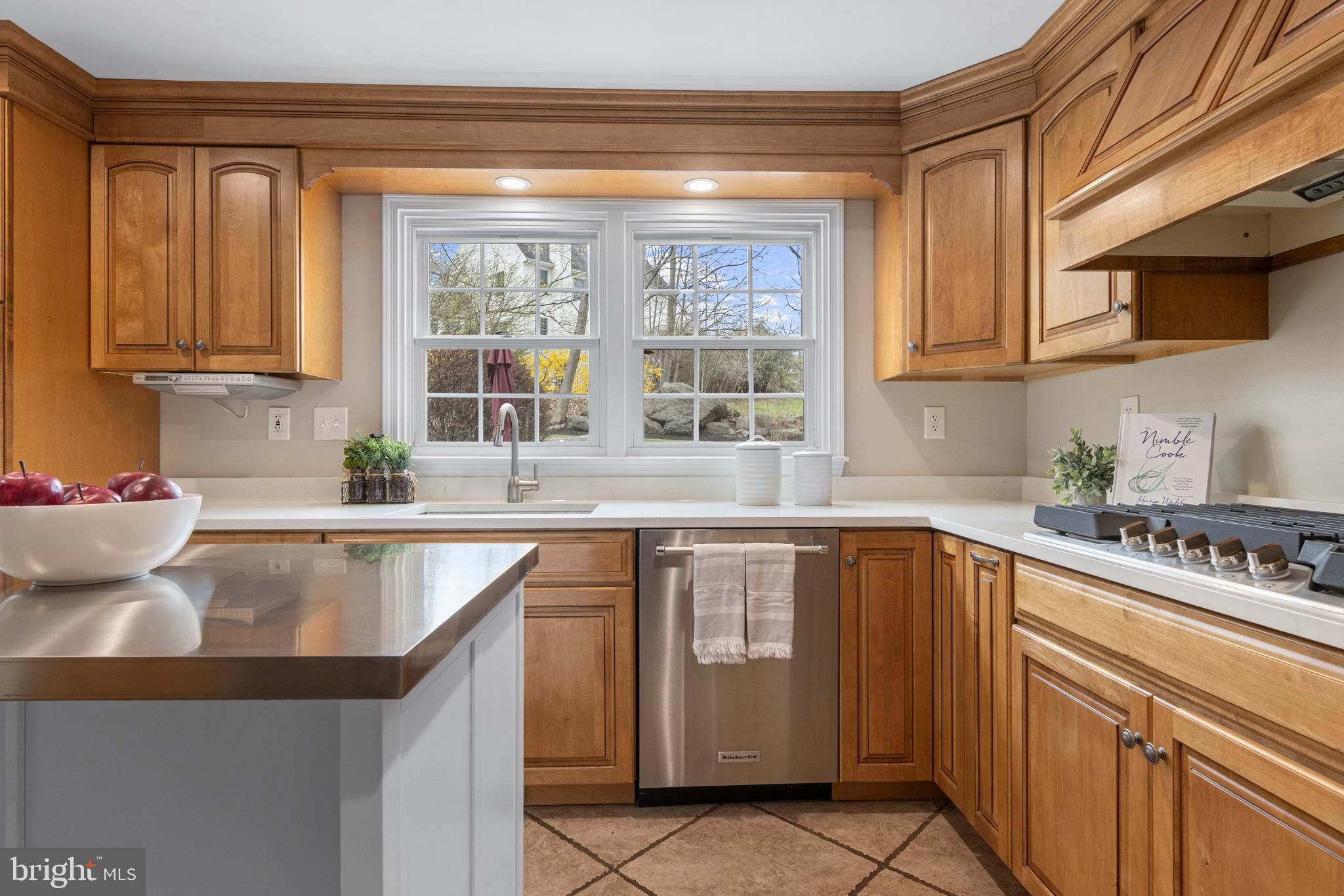 66 Oakford Road Wayne, PA 19087 - Photo 17 of 63 a kitchen with stainless steel appliances granite countertop a sink stove and cabinets