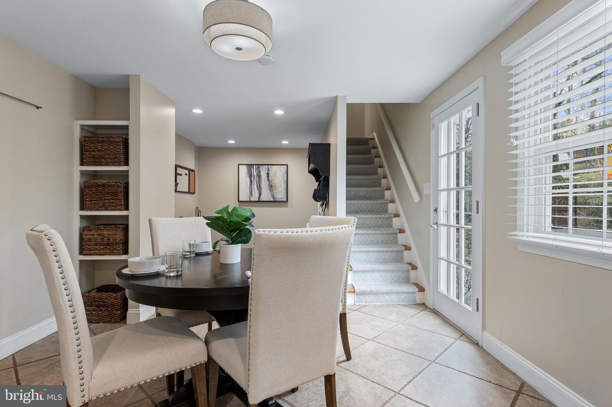 66 Oakford Road Wayne, PA 19087 - Photo 21 of 63 a view of a dining room with furniture and wooden floor