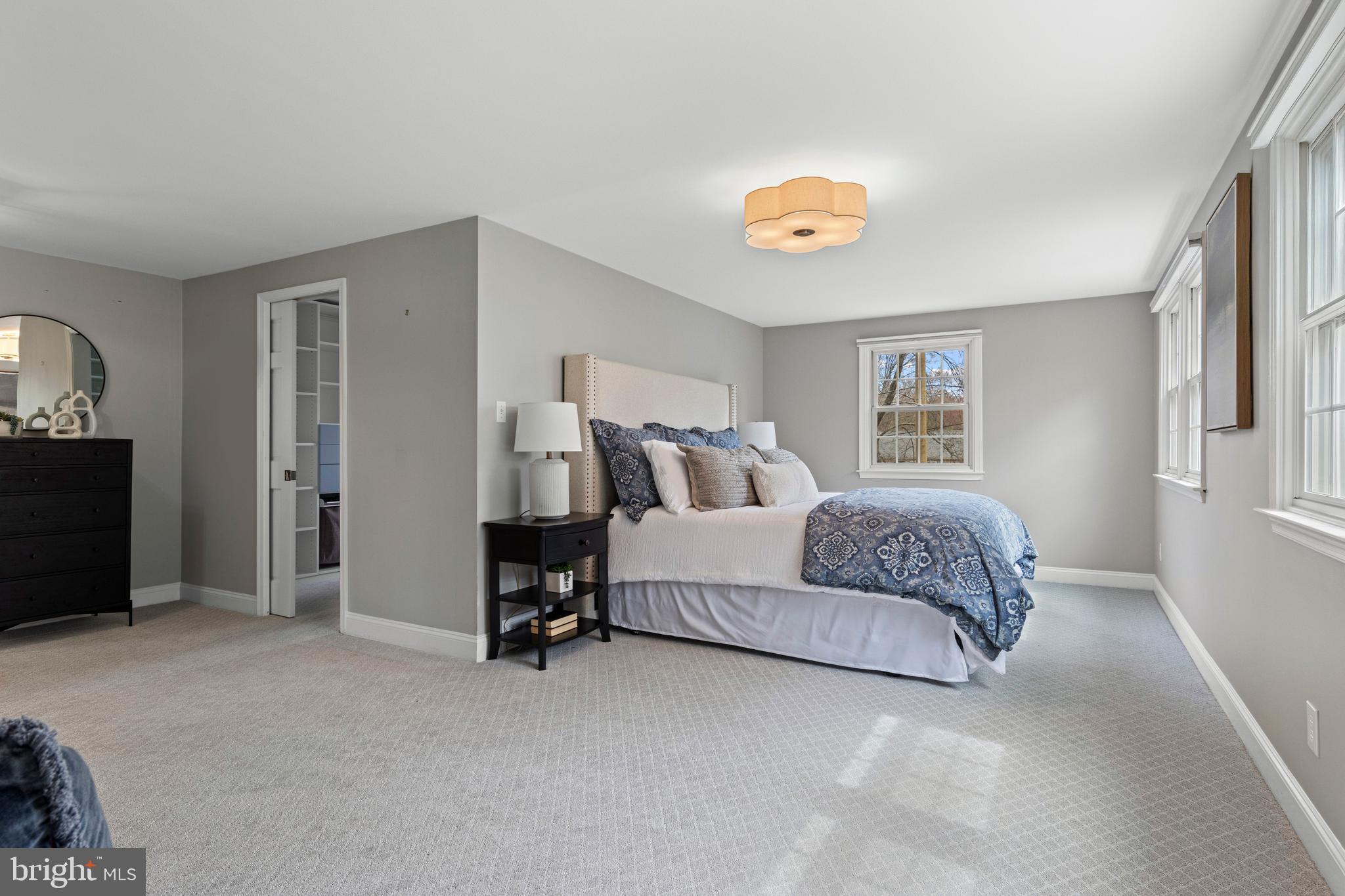 66 Oakford Road Wayne, PA 19087 - Photo 29 of 63 a spacious bedroom with a bed and a lamp