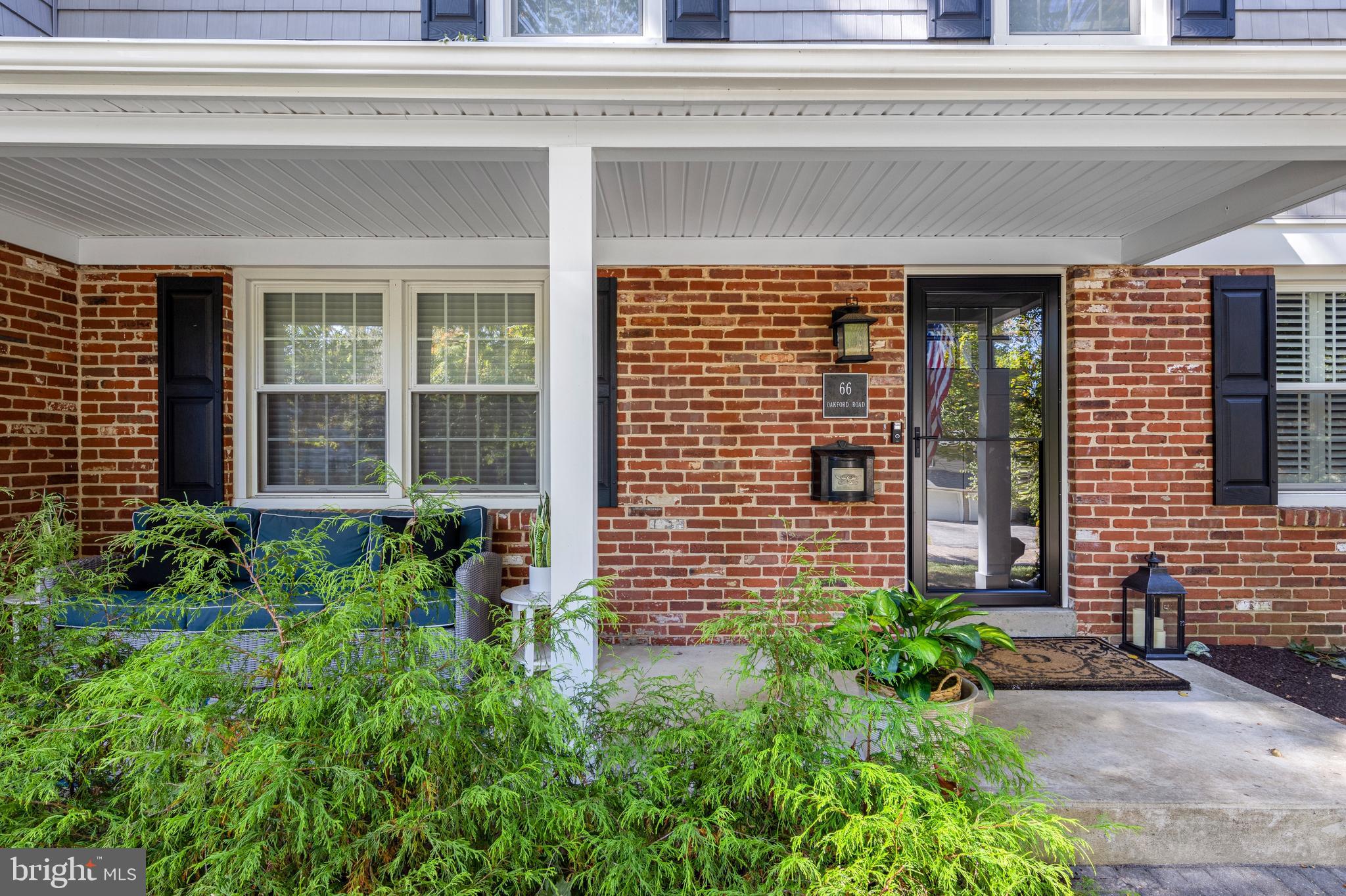 66 Oakford Road Wayne, PA 19087 - Photo 3 of 63 a front view of a house with a garden