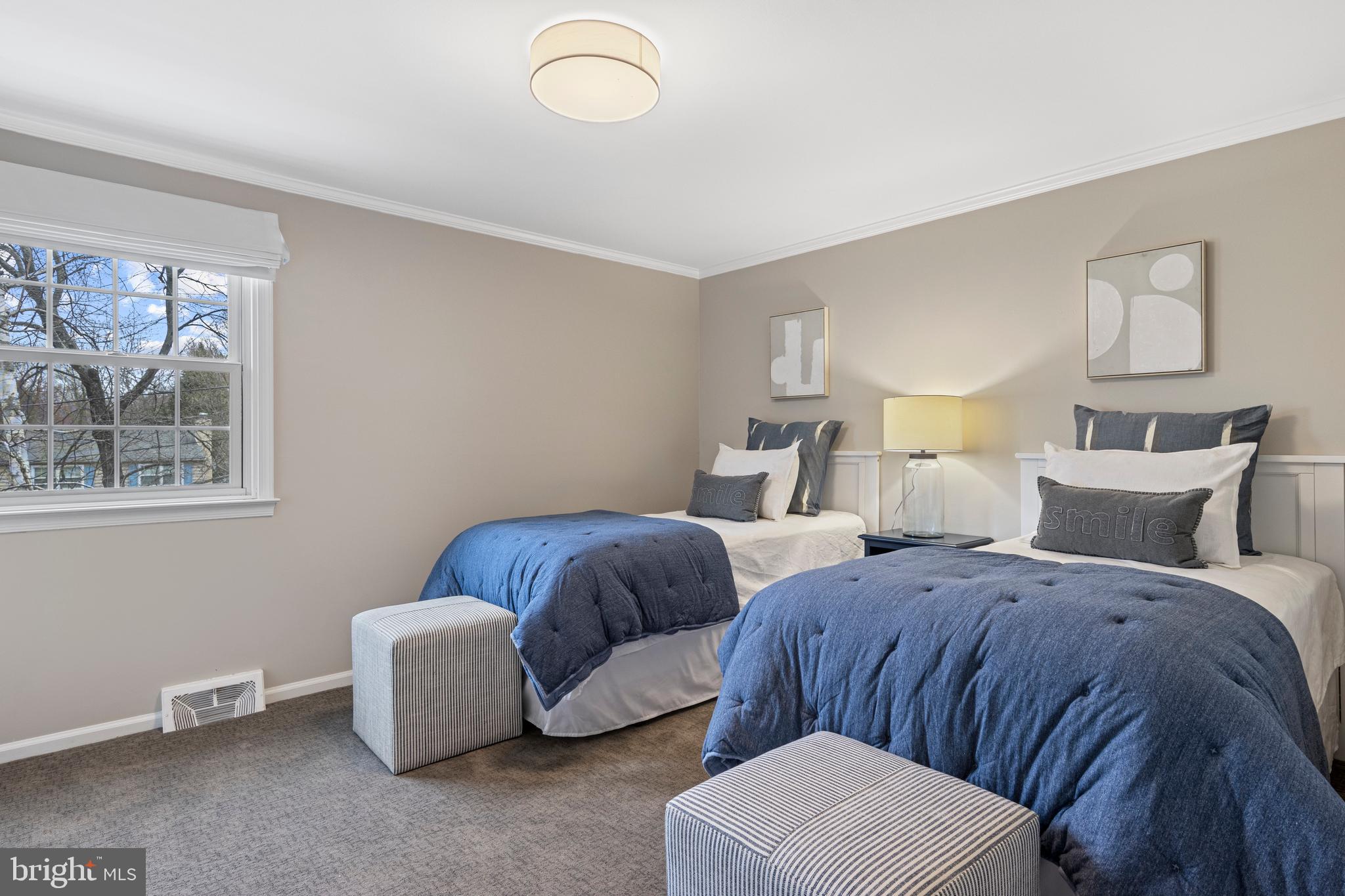 66 Oakford Road Wayne, PA 19087 - Photo 46 of 63 a bedroom with two beds and painting on the wall