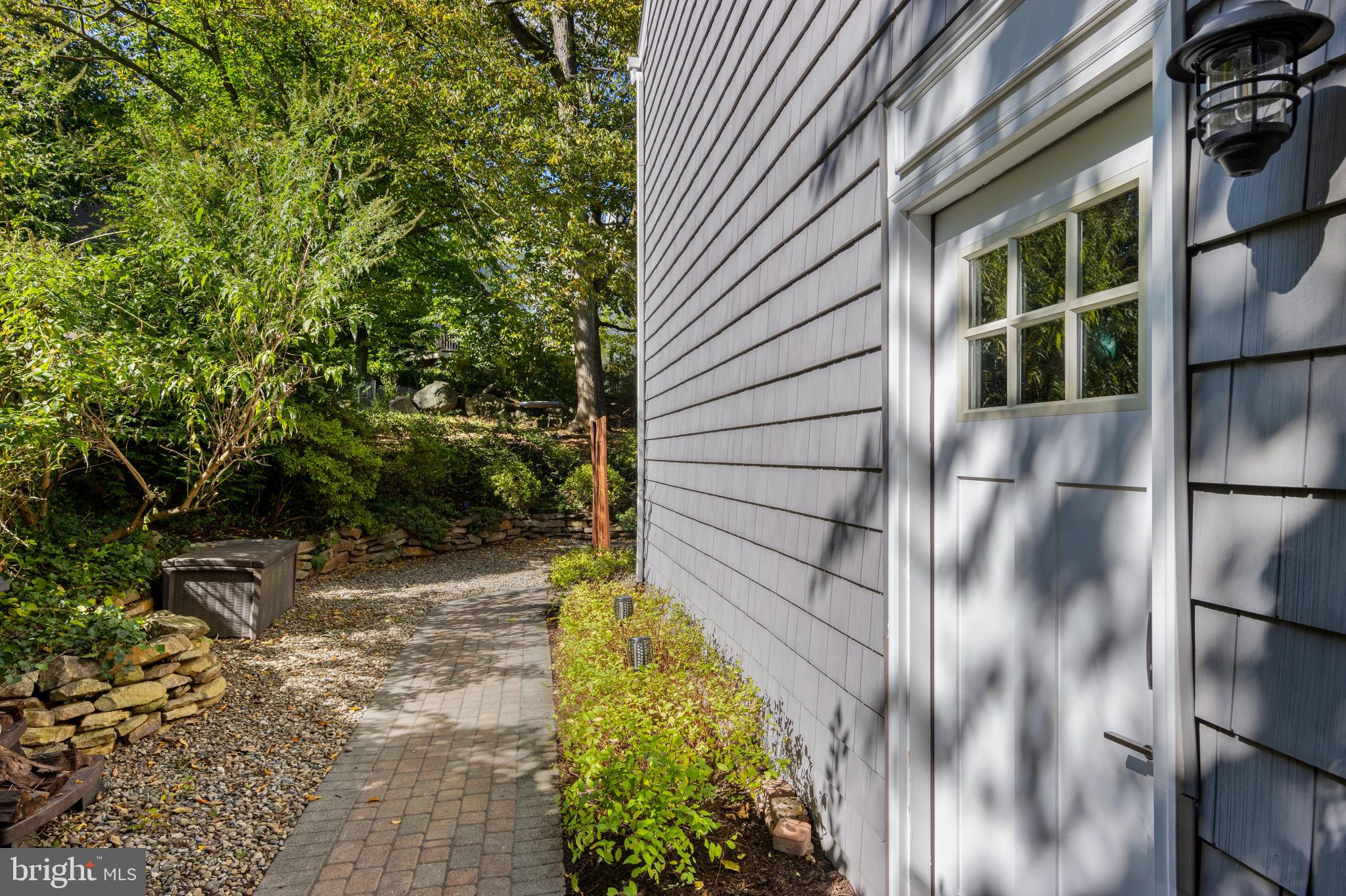 66 Oakford Road Wayne, PA 19087 - Photo 51 of 63 Side yard, privacy gate and garage access