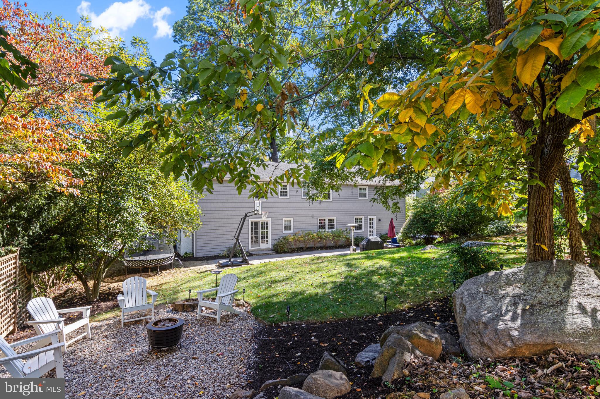 66 Oakford Road Wayne, PA 19087 - Photo 56 of 63 Lush, shaded lawn w/fire pit area and tree swing
