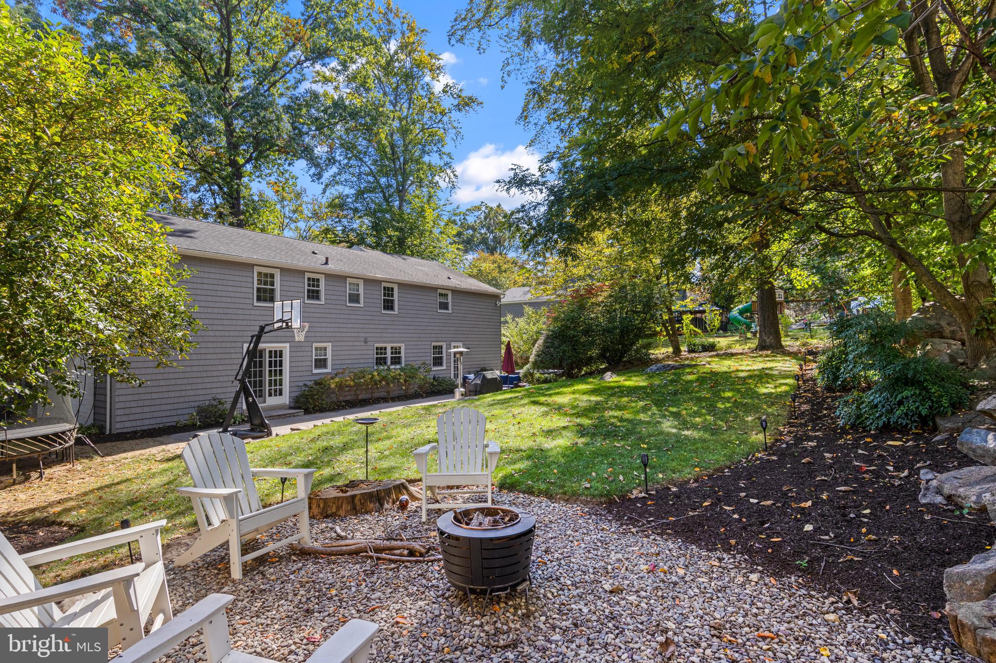 66 Oakford Road Wayne, PA 19087 - Photo 57 of 63 a view of a patio with chairs and a potted plants