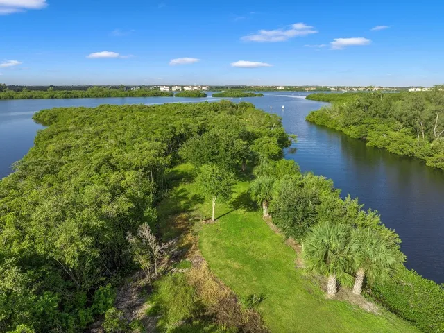 a view of a lake with a big yard