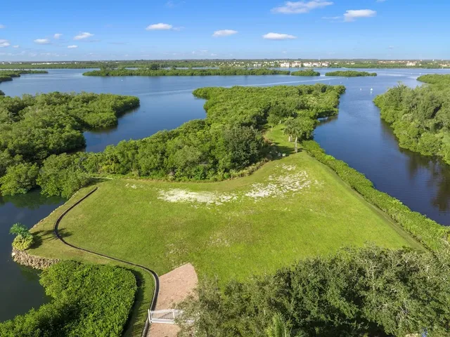 a view of a lake and a yard