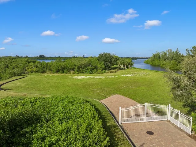 a view of a lake from a yard