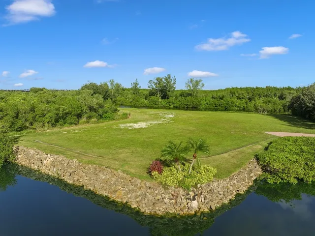 a view of a lake with a big yard