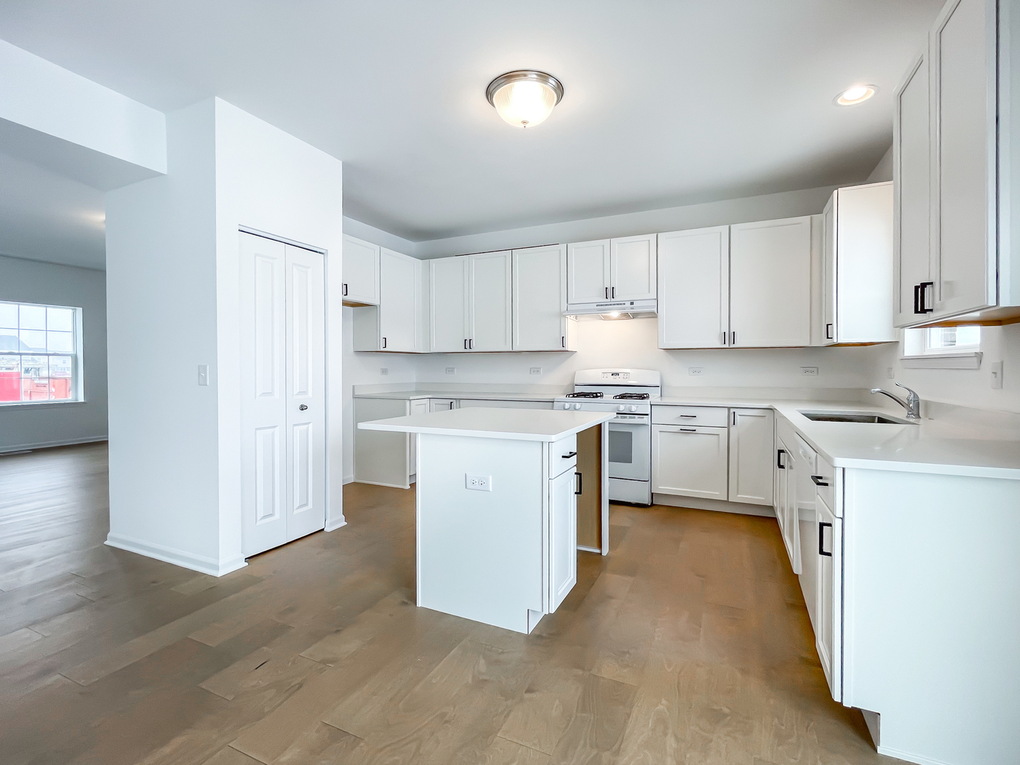 895 Willow Road Manteno, IL 60950 - Photo 3 of 14 a kitchen with cabinets stainless steel appliances and a counter space
