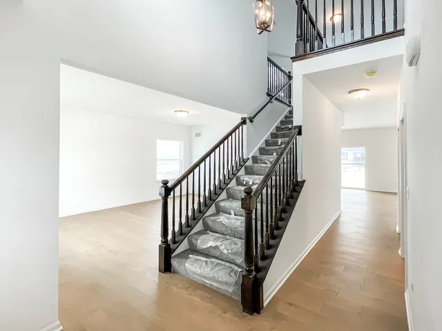 a view of a hallway with staircase