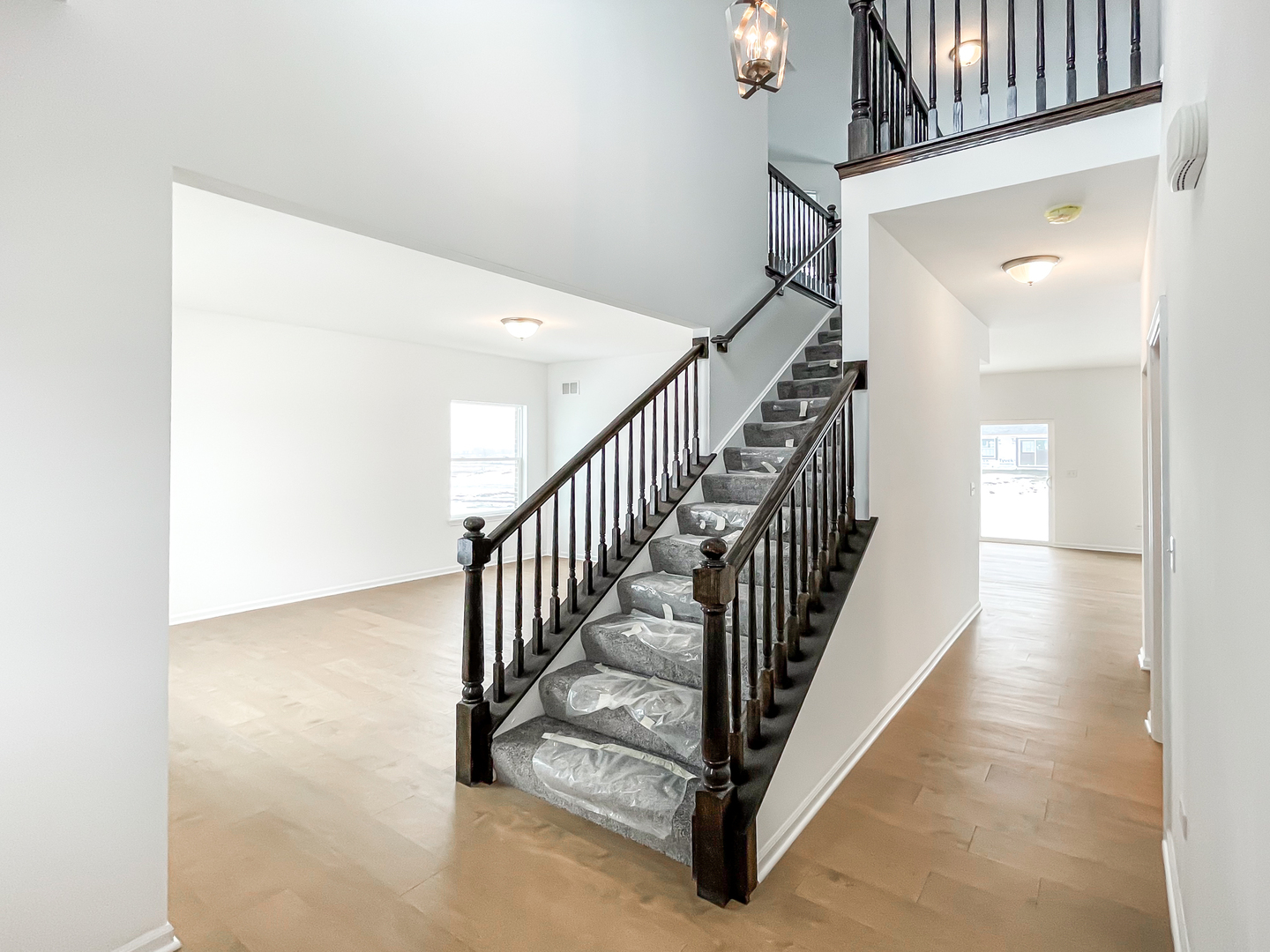 895 Willow Road Manteno, IL 60950 - Photo 5 of 14 a view of a hallway with staircase