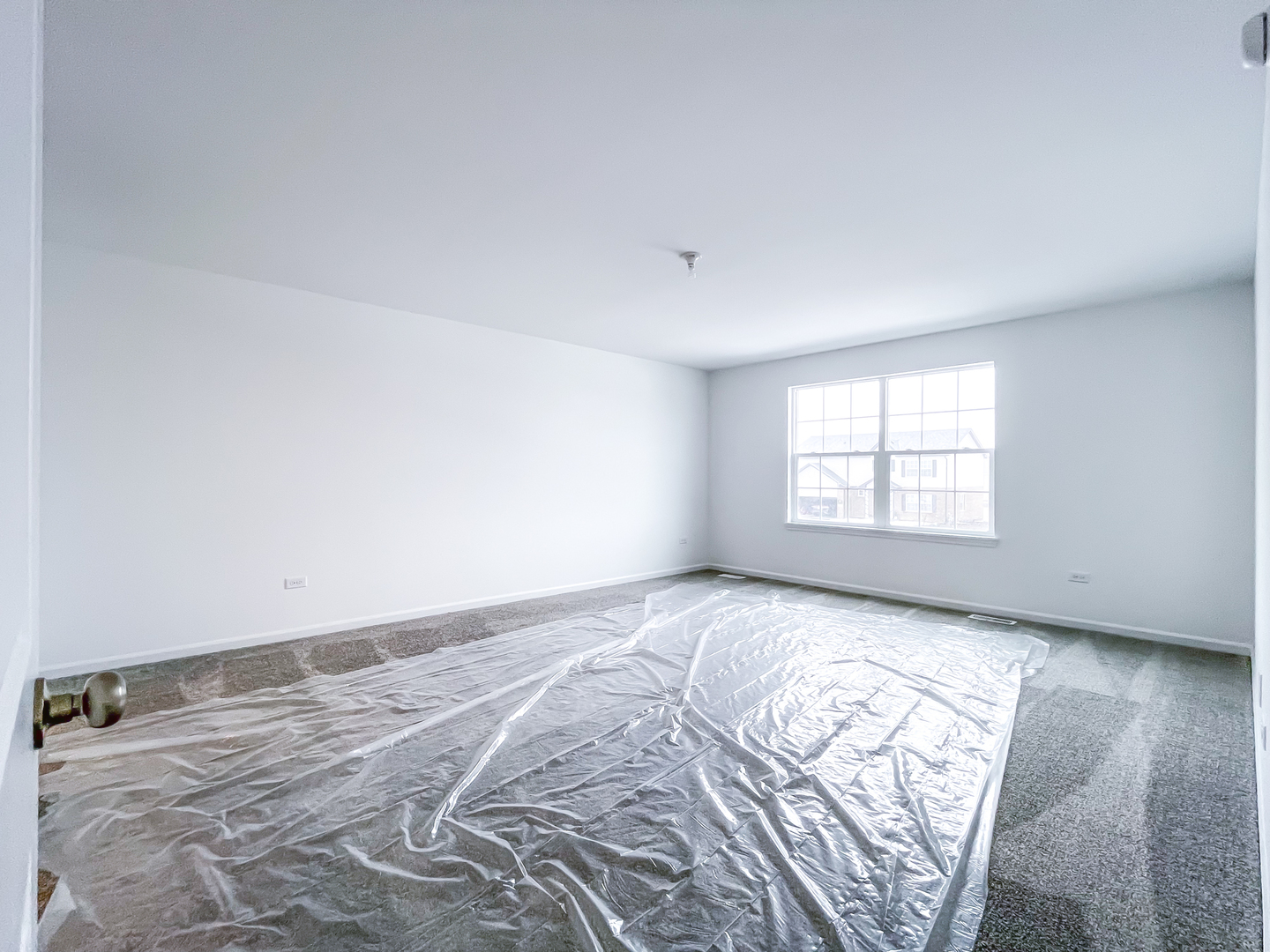 895 Willow Road Manteno, IL 60950 - Photo 8 of 14 an empty room with a bed