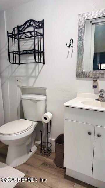 420 9th Avenue South, Unit A Jacksonville Beach, FL 32250 - Photo 13 of 14 a bathroom with a sink toilet and mirror