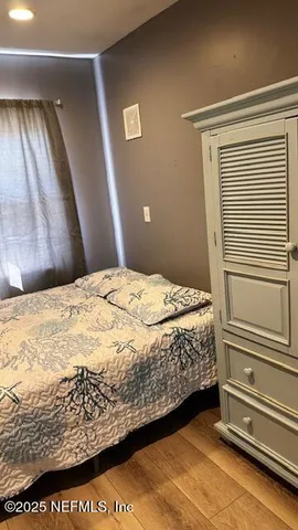 a bedroom with a bed