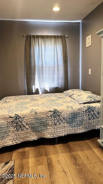420 9th Avenue South, Unit A Jacksonville Beach, FL 32250 - Photo 4 of 14 a bedroom with a bed