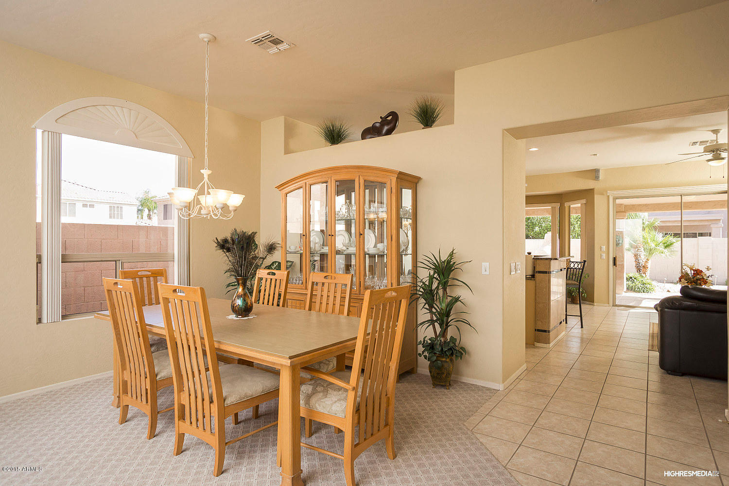 505 East Ranch Road Gilbert, AZ 85296 - Photo 4 of 22 a dining room with furniture and floor to ceiling window