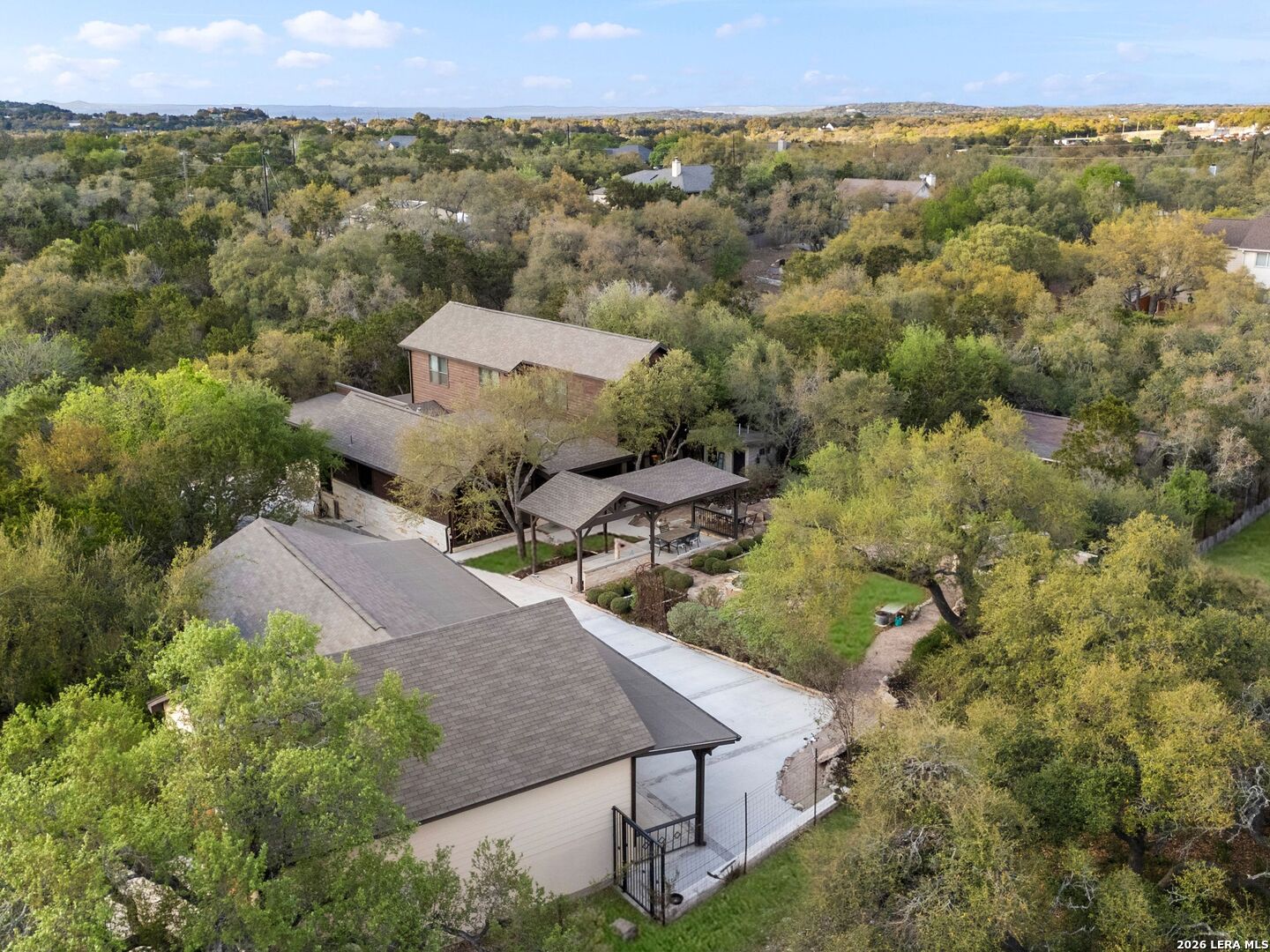1146 Victoria Avenue Spring Branch, TX 78070 - Photo 54 of 89 an aerial view of a house with a yard