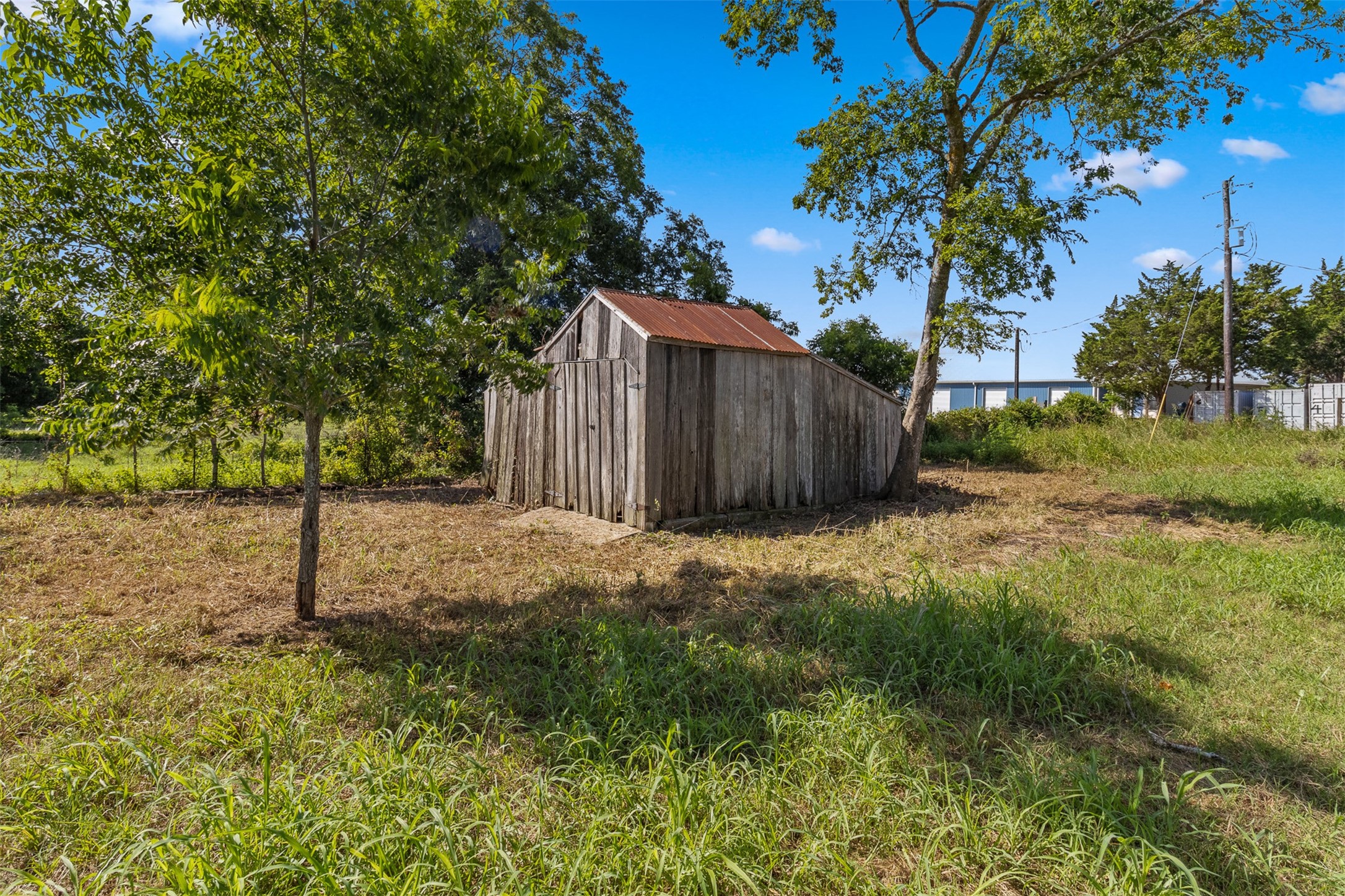 1619 Highway 237 Carmine, TX 78932 - Photo 22 of 26 a house view with backyard space