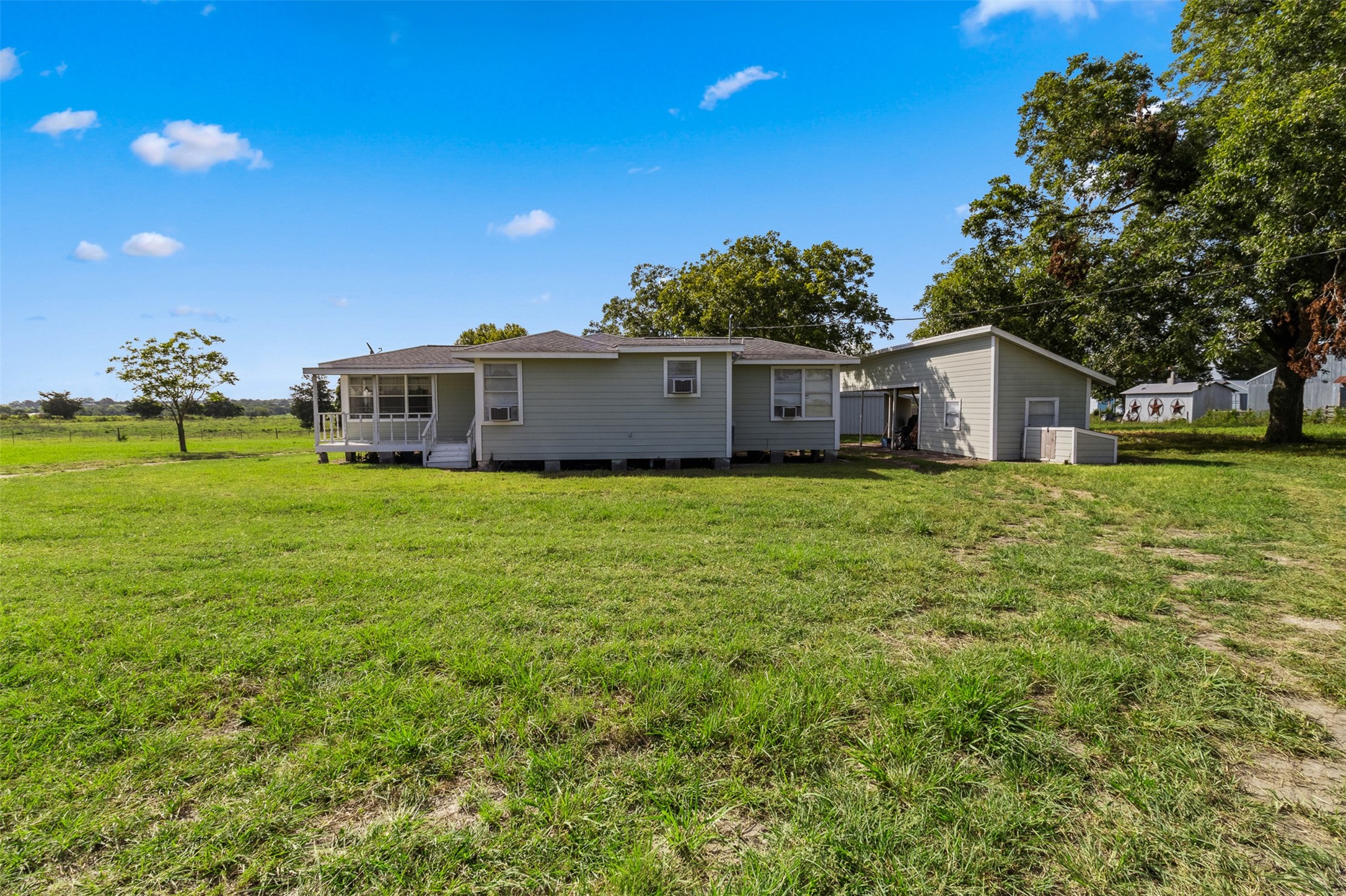 1619 Highway 237 Carmine, TX 78932 - Photo 24 of 26 a view of a house with yard and a garden