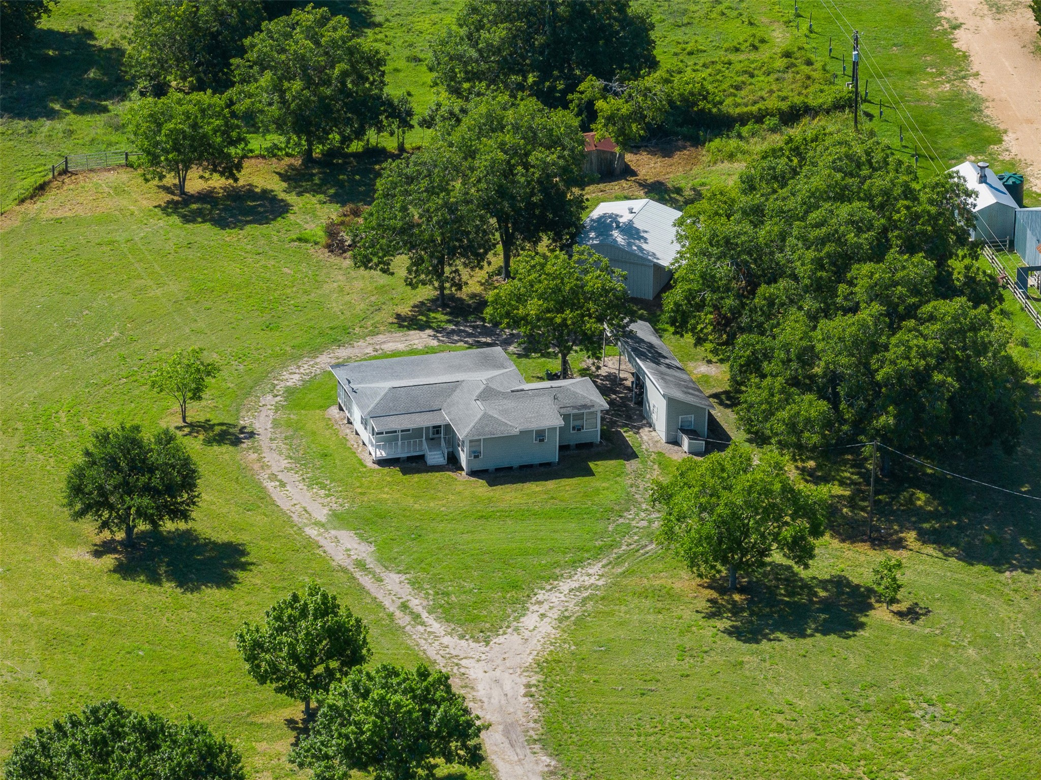 1619 Highway 237 Carmine, TX 78932 - Photo 26 of 26 a aerial view of a house with a yard
