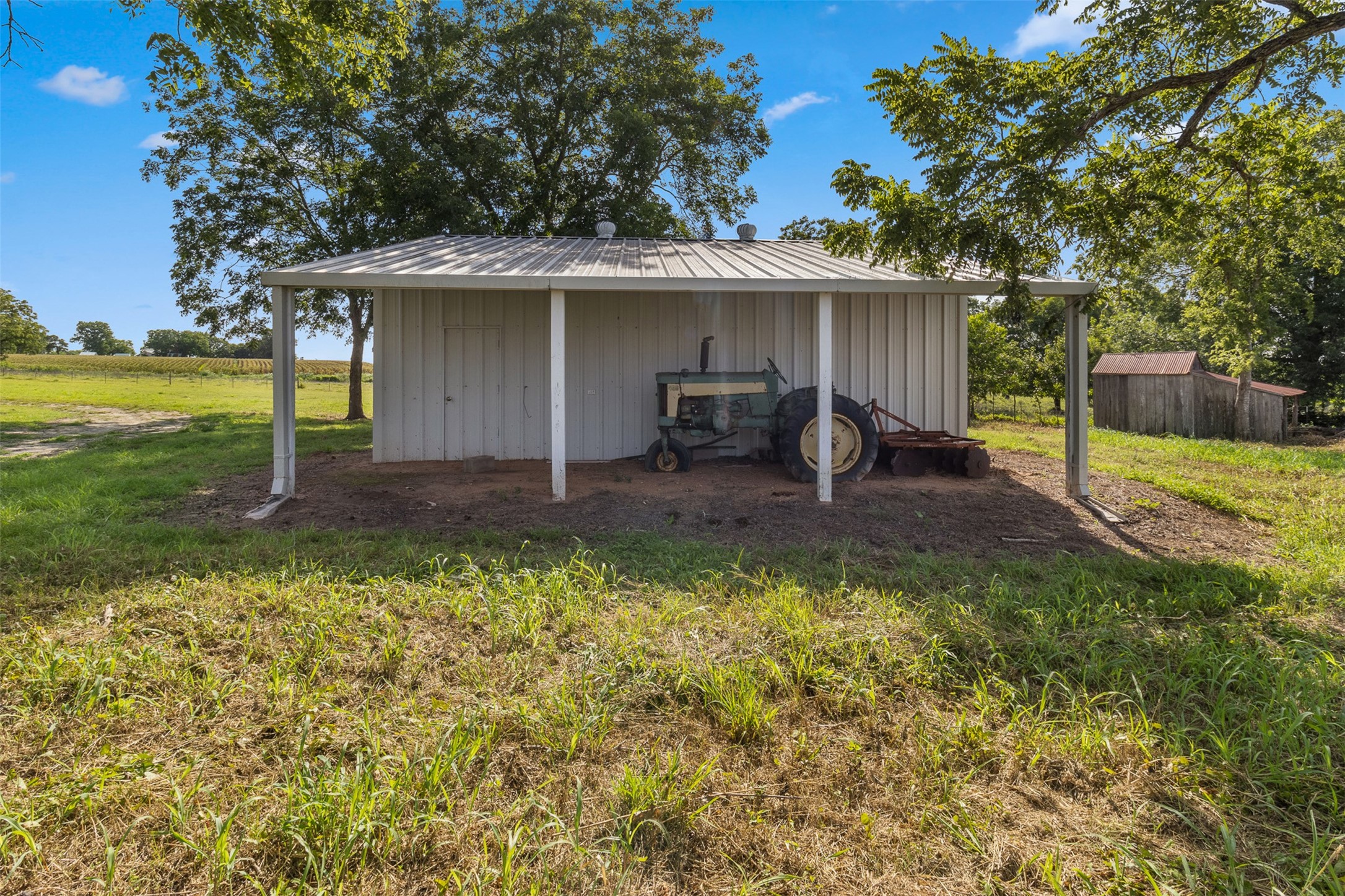 1619 Highway 237 Carmine, TX 78932 - Photo 6 of 26 a view of a house with backyard porch and sitting area