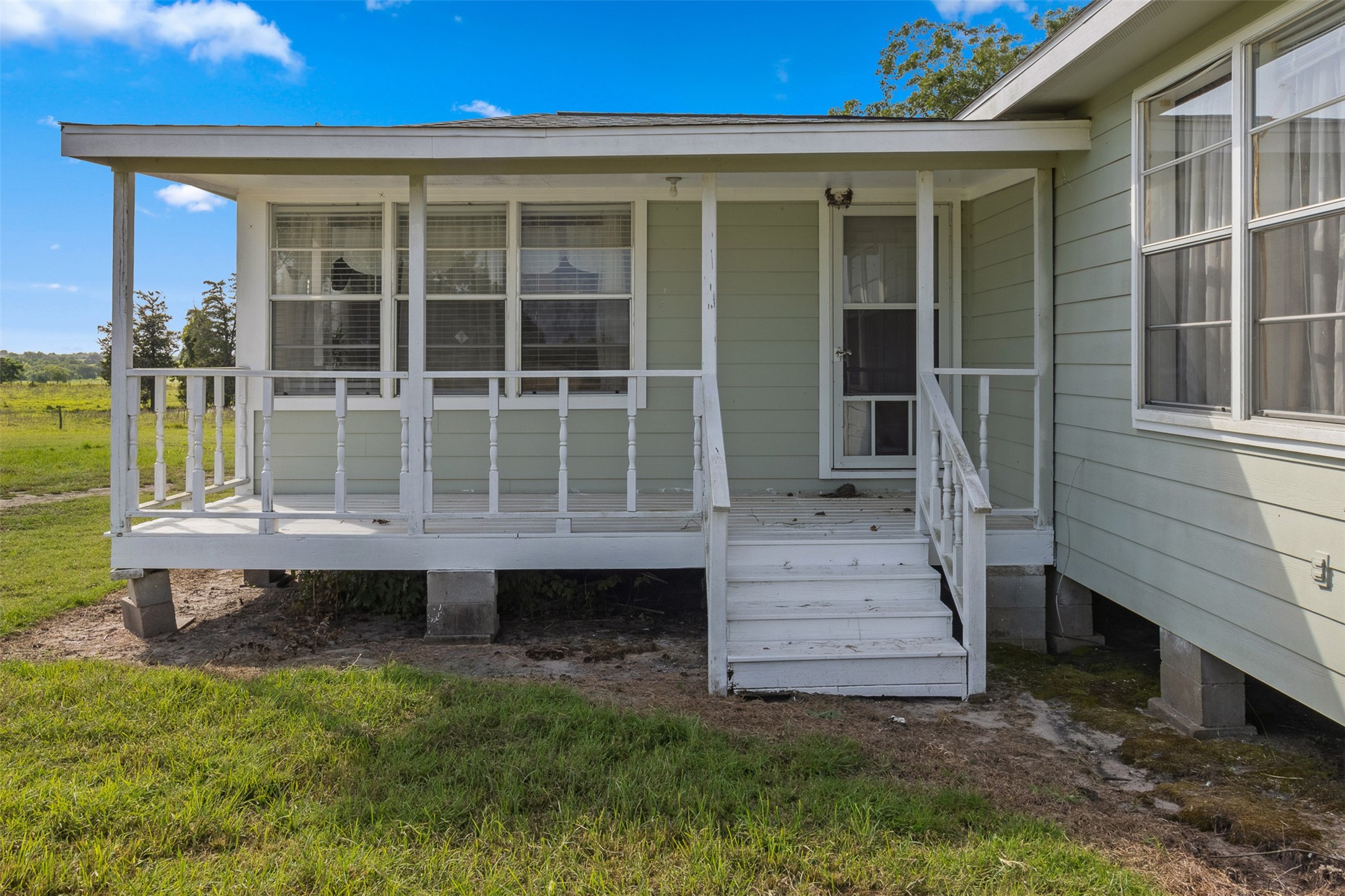 1619 Highway 237 Carmine, TX 78932 - Photo 7 of 26 a front view of a house with a garden