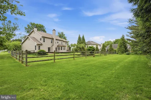 a view of a house with a big yard