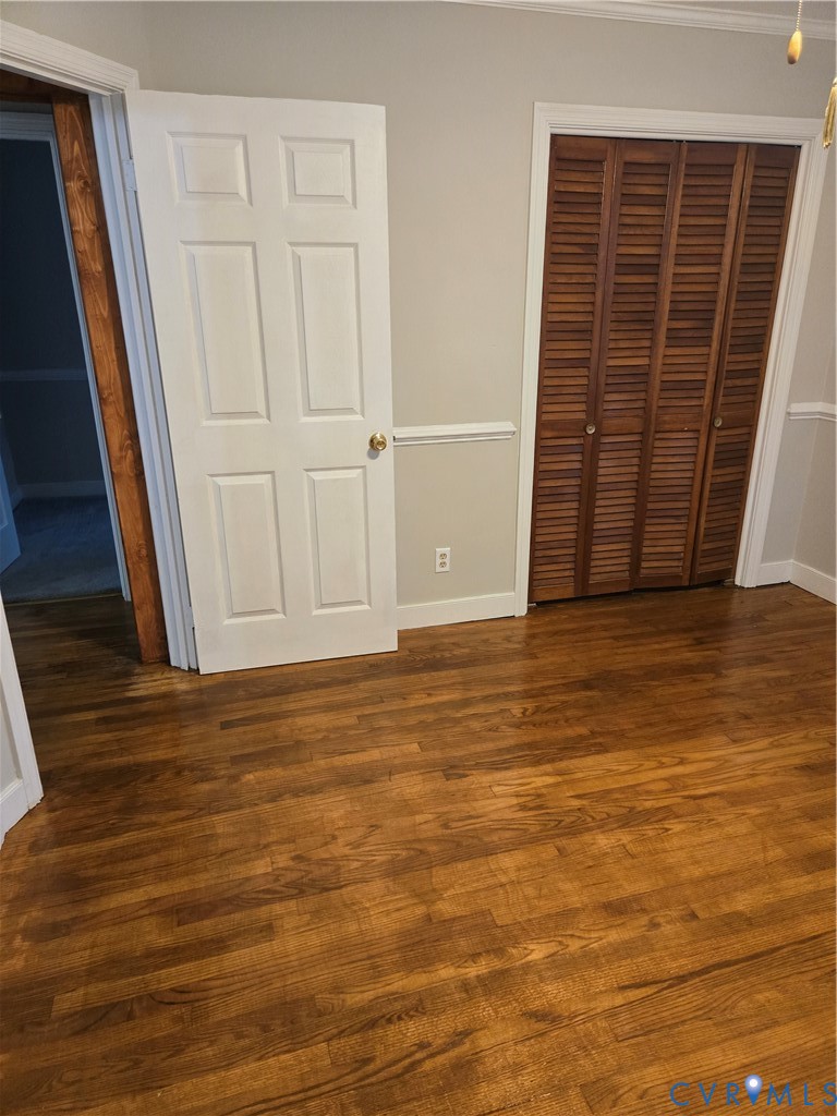 2707 Academy Road Powhatan, VA 23139 - Photo 14 of 27 a view of an empty room with wooden floor and a window