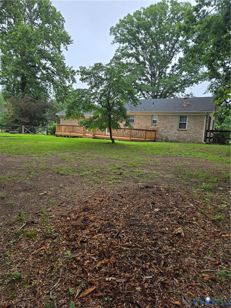 2707 Academy Road Powhatan, VA 23139 - Photo 24 of 27 a view of a house with a yard