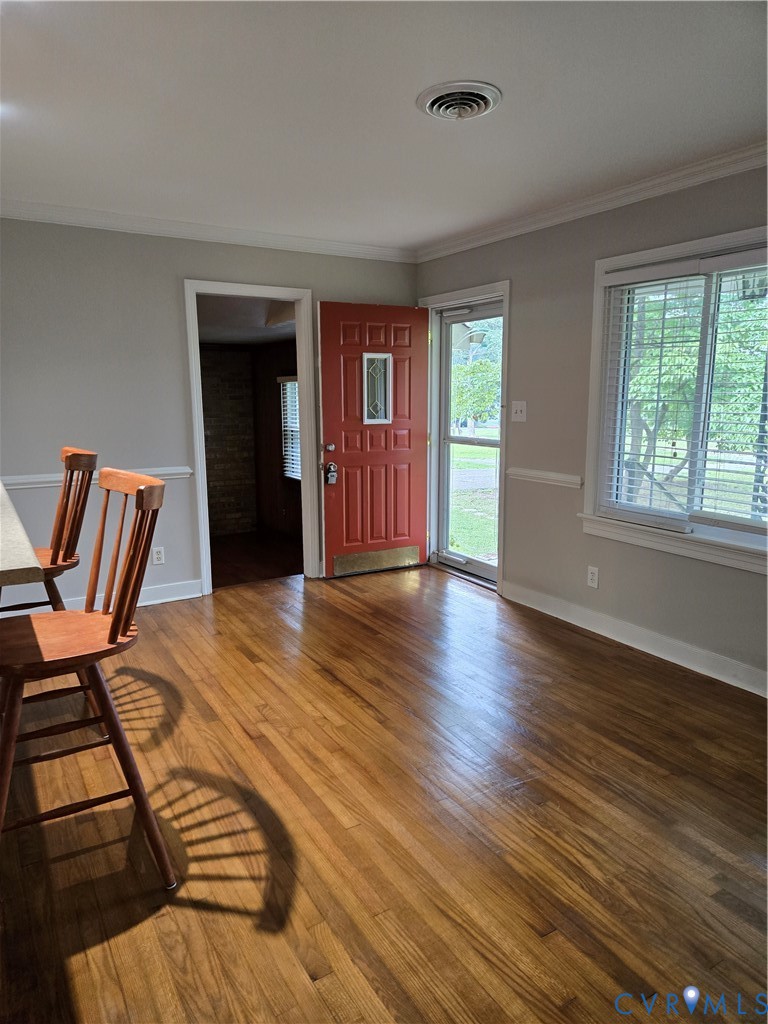 2707 Academy Road Powhatan, VA 23139 - Photo 3 of 27 a view of an empty room with window and wooden floor