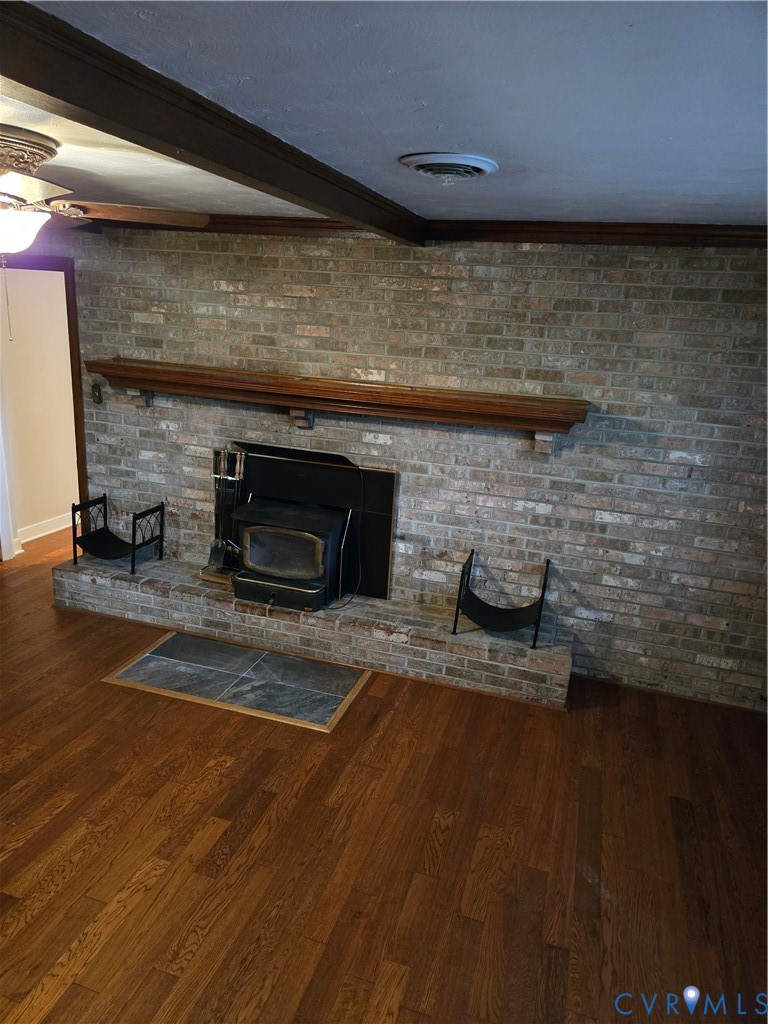 2707 Academy Road Powhatan, VA 23139 - Photo 9 of 27 a living room with a fireplace