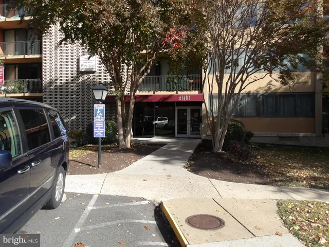 a view of a street with sitting area