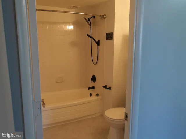 a bathroom with a sink and toilet