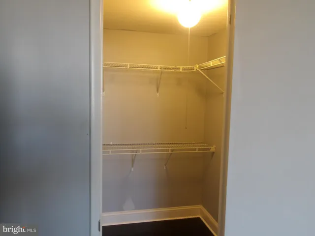 a view of balcony with wooden floor and trees
