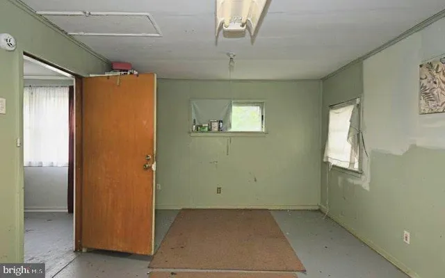 an empty room with windows