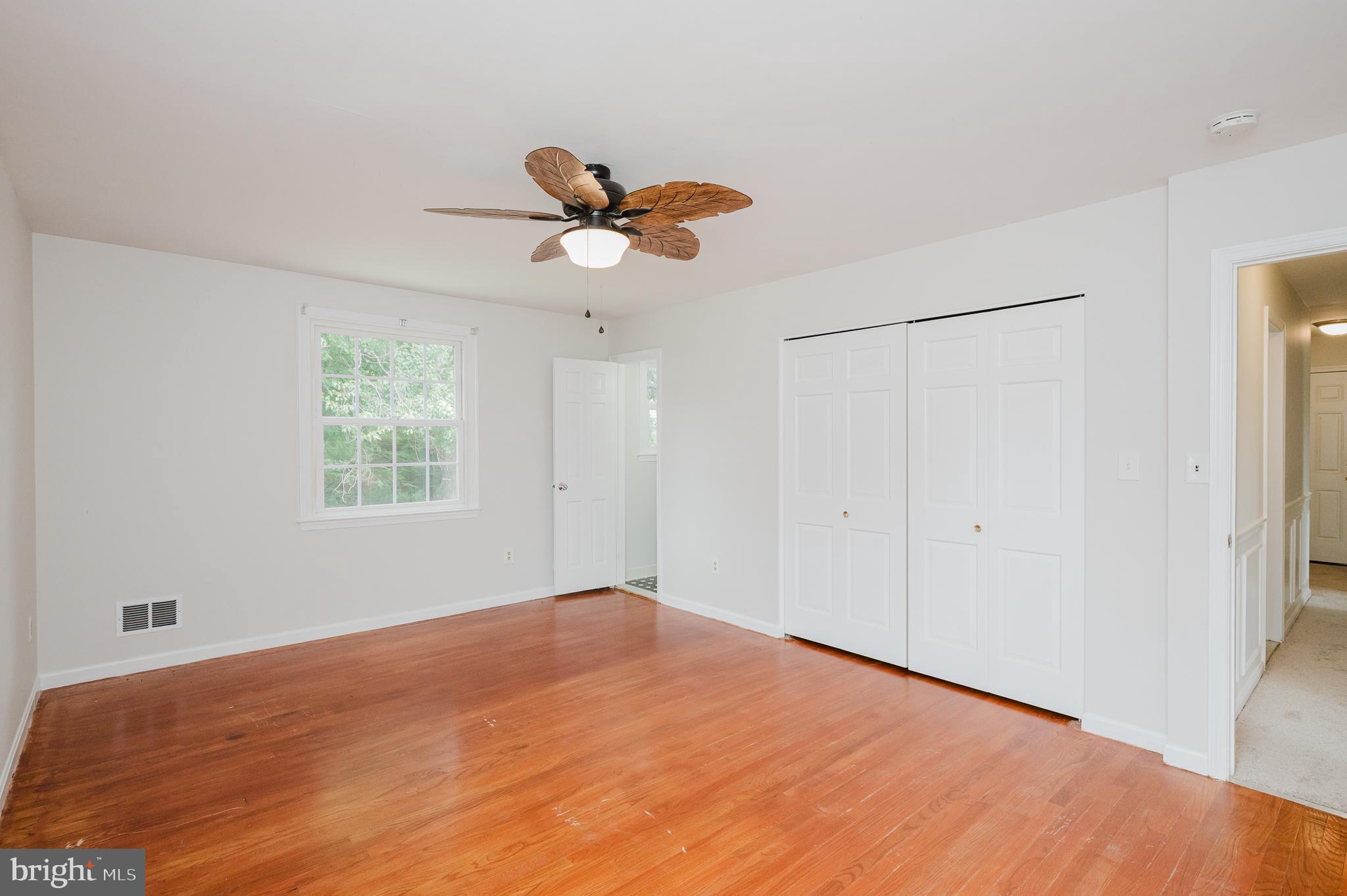 4 Old Spring Court Cockeysville, MD 21030 - Photo 31 of 53 a view of a room with a window and a ceiling fan