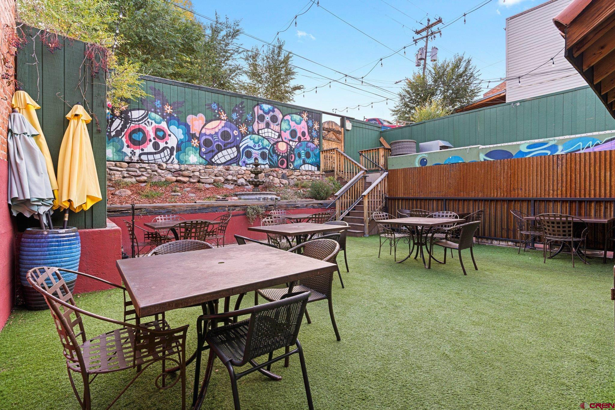 1150 Main Avenue Durango, CO 81301 - Photo 16 of 35 a patio with a table and chairs